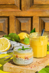 Chia pudding with homemade granola, lemon curd for breakfast