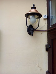old street lamp on wall