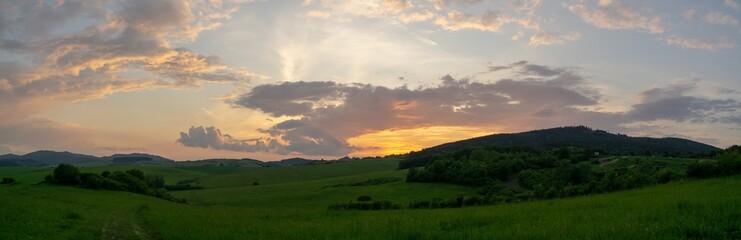 Sunrise or sunset over the hills and meadow. Slovakia