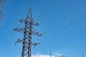 Electricity transmission power lines. The high voltage tower.