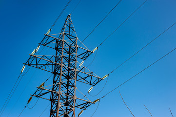 Electricity transmission power lines. The high voltage tower.