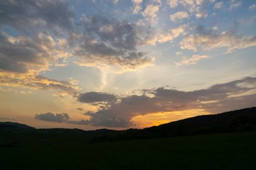 Sunrise or sunset over the hills and meadow. Slovakia