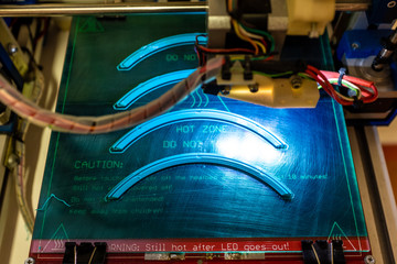 DIY fighting with SARS-CoV-2/Coronavirus and COVID-19 desease: 3D printer is printing plastic parts of medical protective shields