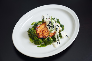 Grilled beef steak and broccoli.