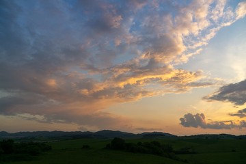 Sunrise or sunset over the hills and meadow. Slovakia