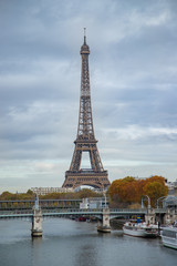 Fototapeta premium The autumn view of famous Eiffel tower in Paris