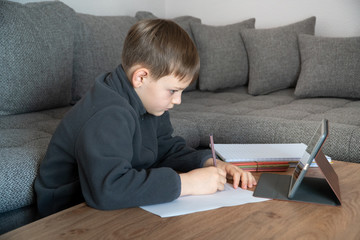 Distance learning online education. Isolated child quarantined at Home in mask distance education and learning. Coronavirus Epidemic. World Crisis COVID-19. Self isolation, home quarantine