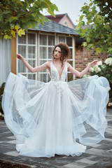 Fototapeta premium Beautiful bride posing in her wedding day
