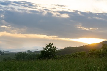 Sunrise or sunset over the hills and meadow. Slovakia