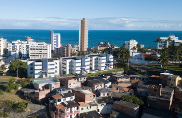 Fototapeta premium Urban social contrast. Slum and buildings.