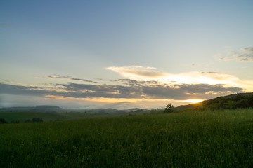 Sunrise or sunset over the hills and meadow. Slovakia