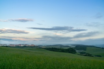 Sunrise or sunset over the hills and meadow. Slovakia