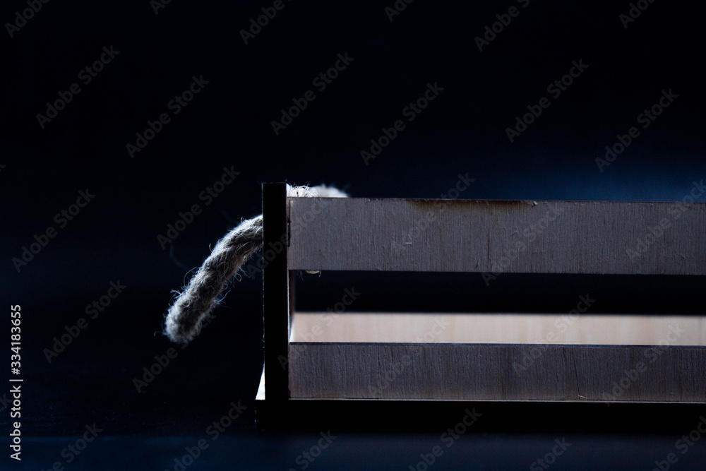 Wall mural wooden tool box on  a black background