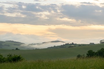 Sunrise or sunset over the hills and meadow. Slovakia