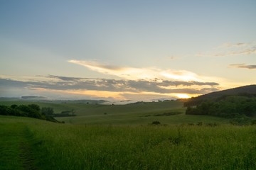 Sunrise or sunset over the hills and meadow. Slovakia