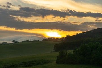 Sunrise or sunset over the hills and meadow. Slovakia