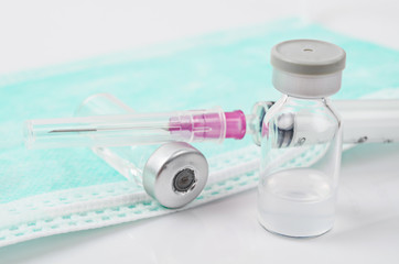 Medicine bottle for injection and medical surgical mask.