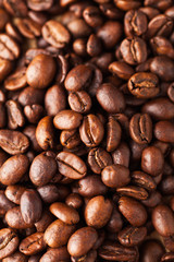Arabica coffee beans close-up. For screensavers, backgrounds, textures, roasters, and coffee sellers.