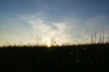 Sunrise or sunset over the hills and meadow. Slovakia