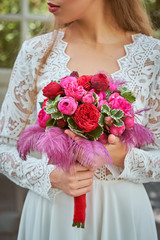 closeup photo Bride hands holding wedding bouquet