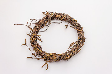 Wicker wreath of birch branches isolated on white background. Easter zero waste, DIY concept