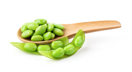 soybeans in wood spoon on white background
