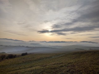 Sunrise or sunset over the hills and meadow. Slovakia	