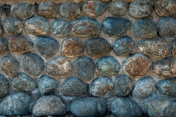 Oval stone wall texture background pattern