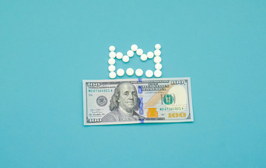 American dollars  with a crown of pills