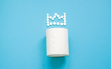 Toilet paper with a crown of pills
