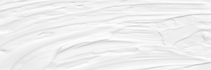 Obraz premium Cream texture for skin nourishment for good skin health Lotion Cosmetics Full frame Background Abstract texture Longitudinal Panorama High resolution.