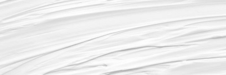 Obraz premium Cream texture for skin nourishment for good skin health Lotion Cosmetics Full frame Background Abstract texture Longitudinal Panorama High resolution.