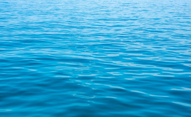 Surface of beautiful blue Ocean background texture for background or backdrop