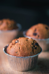 Home made delicious banana with grain cake on wooden table.