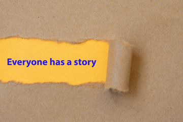 Everyone has a story, word written under torn paper