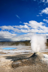 Small geyser in Hverasverdi, Iceland. Vertical view..