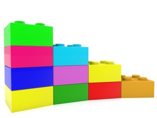 Colored toy bricks stacked as steps on white
