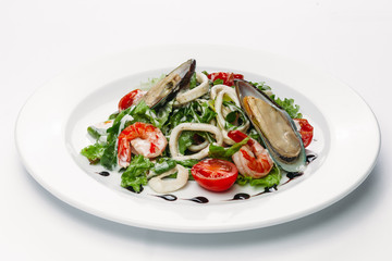 salad with egg on a plate on a white background