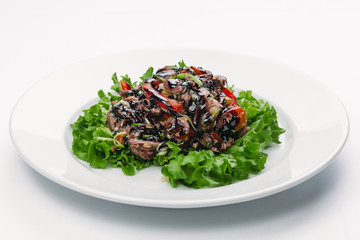 steak on lettuce leaves