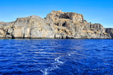 Fototapeta na wymiar Located on the east coast of the island of Rhodes, the small town of Lindos is a natural and historical pearl of the Mediterranean. 
