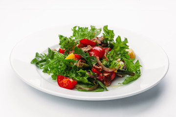 green salad on a white plate