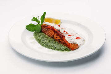fish in white and green sauce