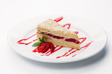 Delicious slice of Torat on a white background