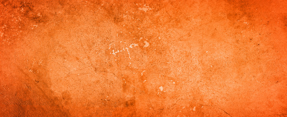 Orange background on cement floor texture - concrete texture - old vintage grunge texture design - large image in high resolution