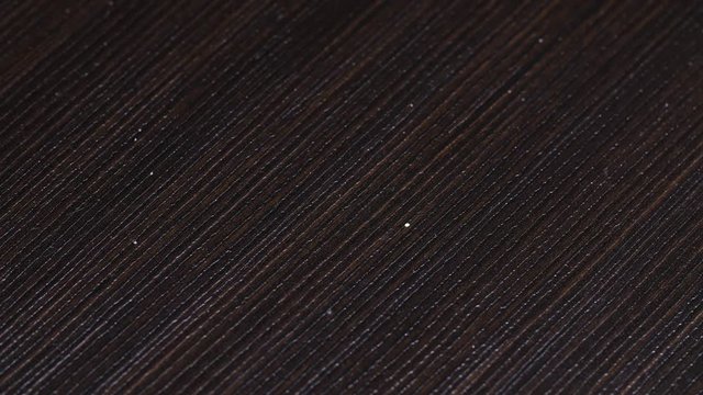 Payment with a metal coin. Commemorative coins mcdonalds , throw a coin on the table