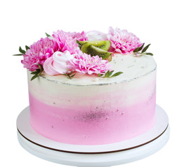 Obraz na płótnie Canvas Pink cake isolated on white . Meringues and pink flowers on the top of cake . Concept for Wedding , St. Valentine's Day, Mother's Day, Birthday Cake. Baking cake template