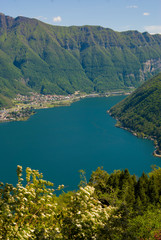 View of the Parco San Grato in Lugano, Switzerland. Alpine mountain scenery on a sunny summer day and views of Lake Lugano. 