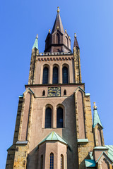 Fototapeta na wymiar Church tower with a clock