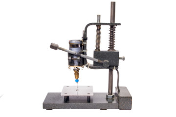 Home-made PCB drilling machine isolated on white background