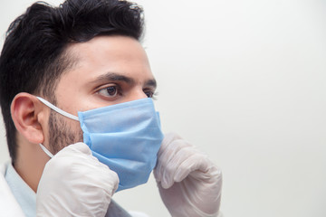 Male Doctor wearing Surgical Mask